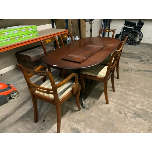 839 - A reproduction twin pedestal dining table and six chairs