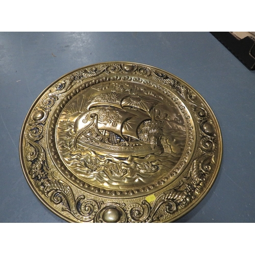 103 - A tray of assorted metal ware to include brass candlesticks