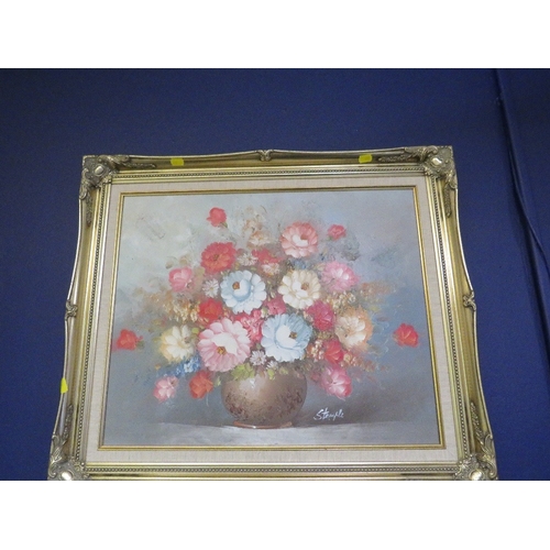 46 - A modern gilt framed still life oil on canvas, depicting a vase of flowers, signed lower right