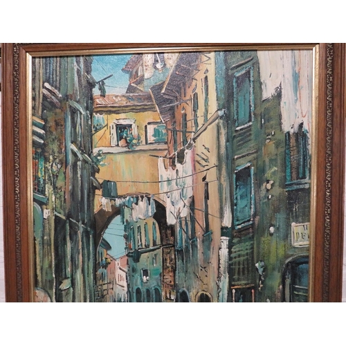 58 - An oil on canvas impressionist continental street scene