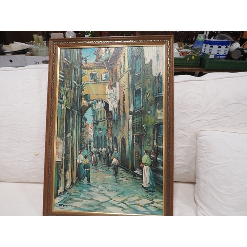 58 - An oil on canvas impressionist continental street scene