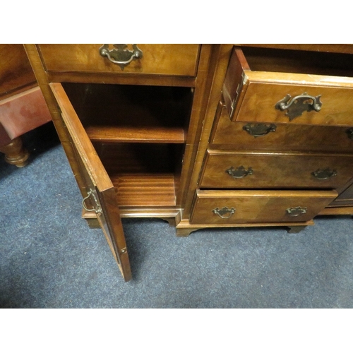 844 - A walnut reproduction breakfront sideboard A/F