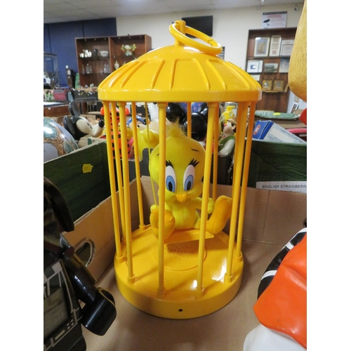 171 - A talking Tweety Pie figure in cage, together with a Darth Vader clock and a Dutch / Holland 'cheeri... 