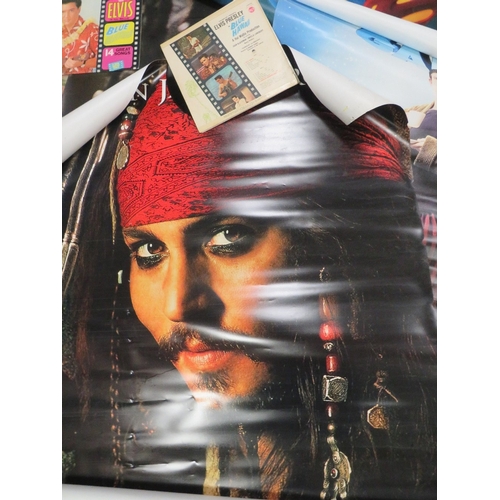 35 - A collection of assorted rolled film posters to include Avatar, Pirates of the Caribbean etc……. (5)