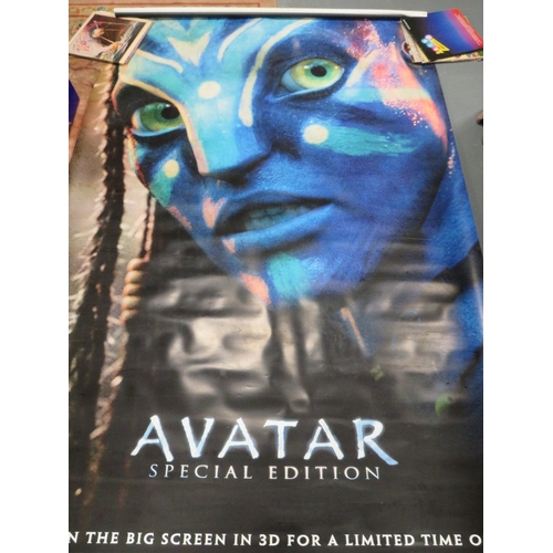 35 - A collection of assorted rolled film posters to include Avatar, Pirates of the Caribbean etc……. (5)