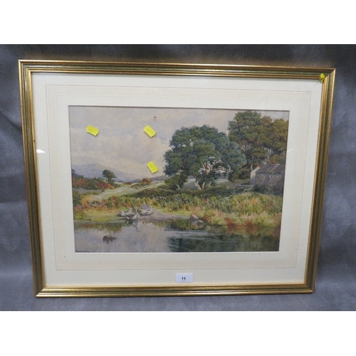 11 - W H Wilkinson, a framed and glazed watercolour of ducks on a riverbank, building s and woodland beyo... 