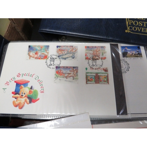 129 - Seven albums of first day covers (some with coins) and post cards