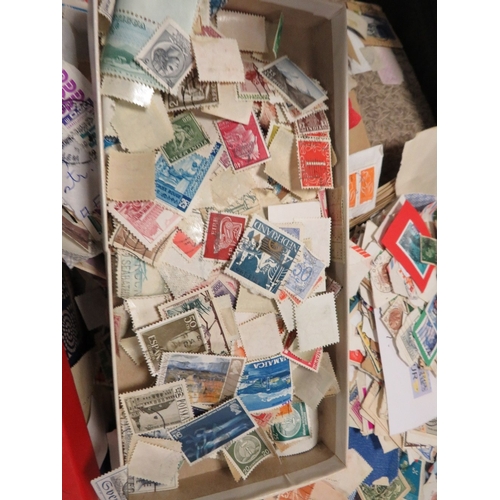 139 - A suitcase of loose stamps