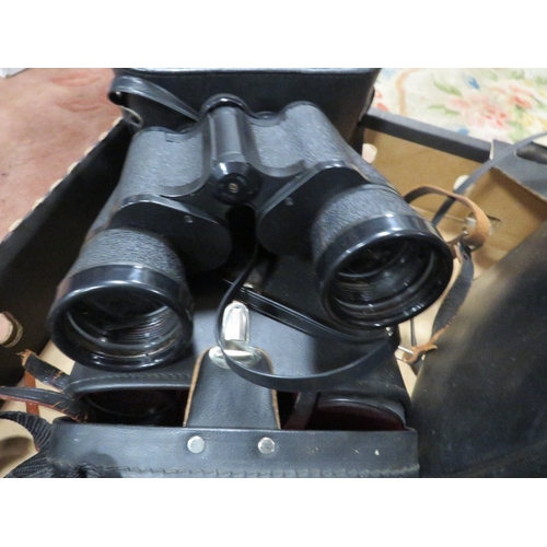 141 - A tray of collectables to include binoculars