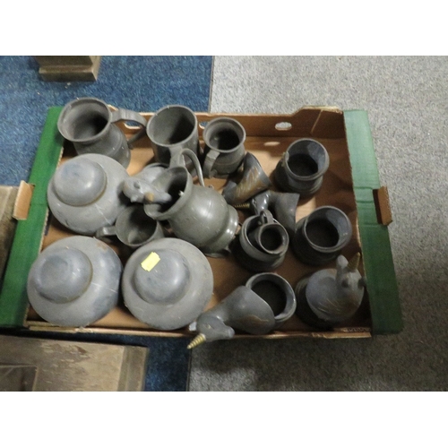 153 - Four trays of assorted pewter and metal ware