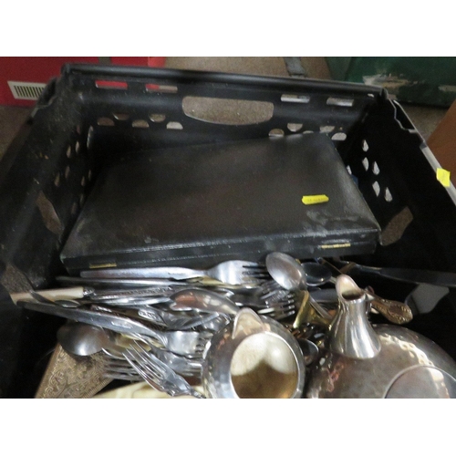 185 - A tray of metalware and cutlery