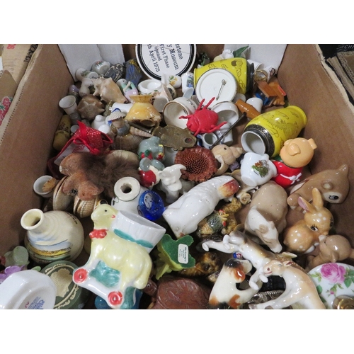 192 - Four trays of assorted ceramics to include commemorative ware