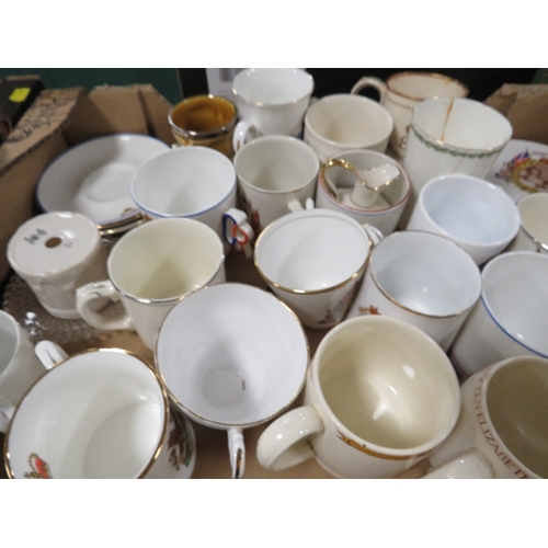 192 - Four trays of assorted ceramics to include commemorative ware