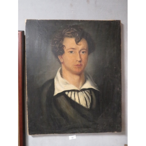 23 - An unframed portrait oil of a young man