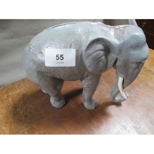 55 - **A cast metal elephant money box**