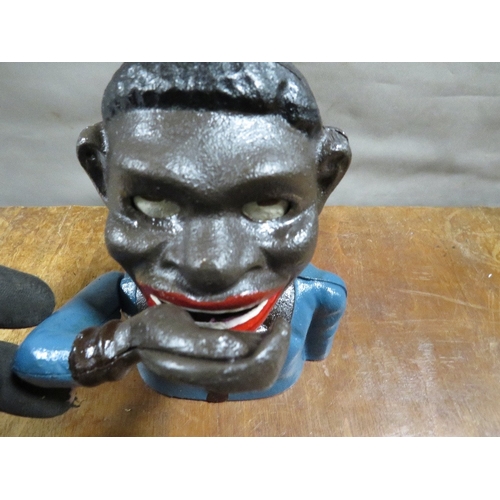 60 - **A smiling Sam money bank**