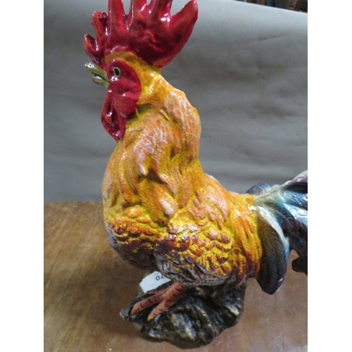 70 - **A cast iron painted cockerel**