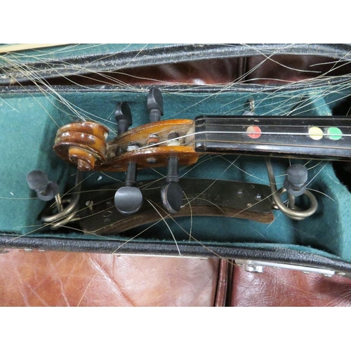 243 - A cased Chinese violin and bow