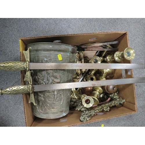 253 - A tray of brassware to include pairs of candlesticks and ornamental swords