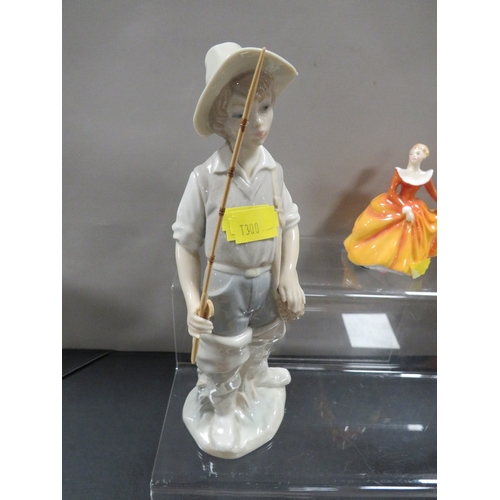 304 - Four ceramic figures to include a boxed Lladro figure of a fishing girl