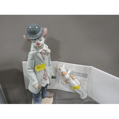 305 - A boxed Lladro figure of a clown together with a boxed Lladro toy soldier figure