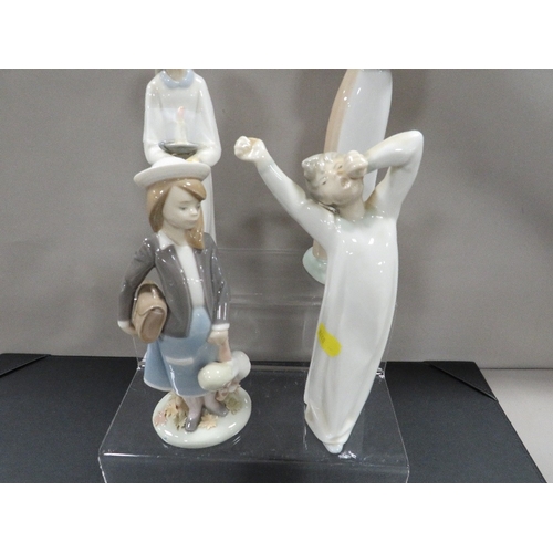 308 - Three Lladro figurines together with a Nao figurine (4)