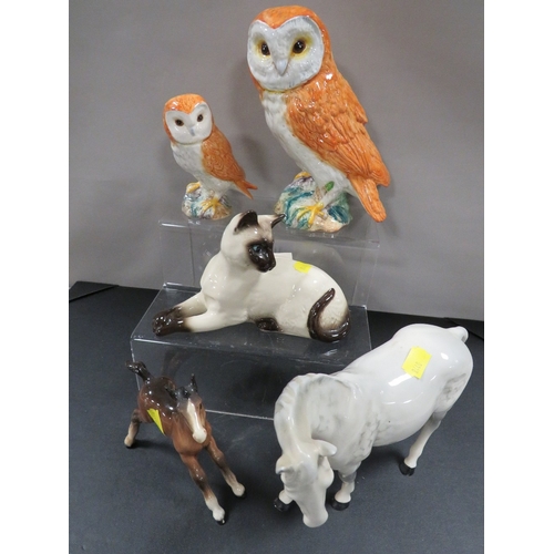 313 - A collection of five Beswick animal figures including a grey mare facing left