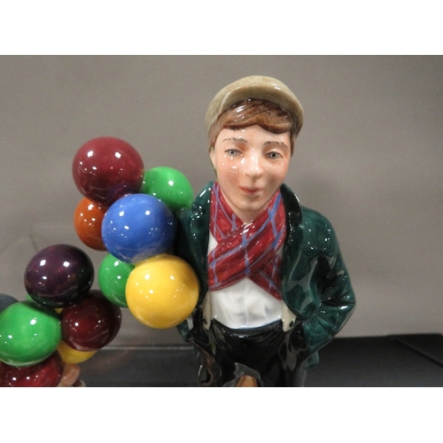 317 - A Royal Doulton balloon boy together with a balloon girl (2)