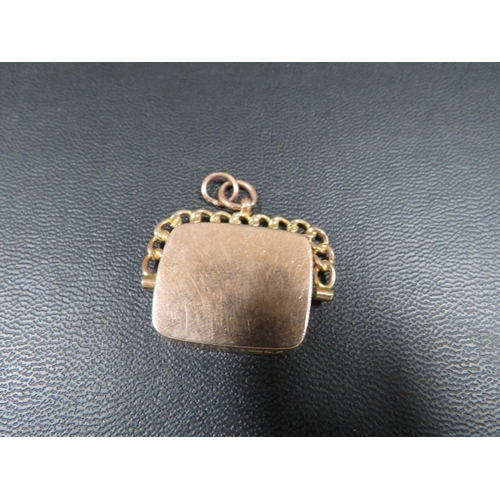 361 - A hallmarked 9 carat gold blood swivel fob