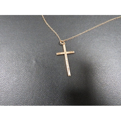 371 - A hallmarked 9 carat gold cross on chain approx weight 2.5g