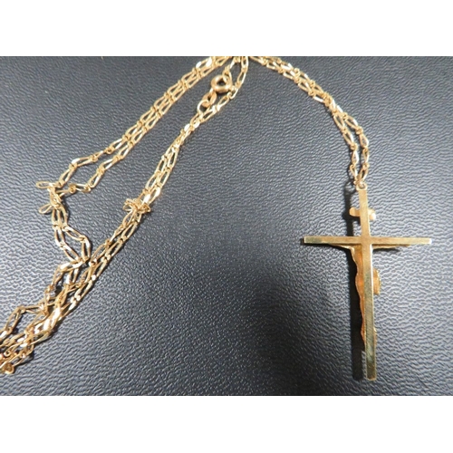 372 - A hallmarked 9 carat gold crucifix on chain approx weight 5.8g