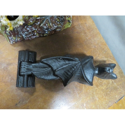 74 - **Three cast metal doorknockers - A cat, bird and bat**