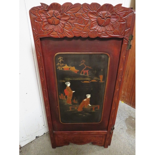 215 - A small oriental two panel folding screen