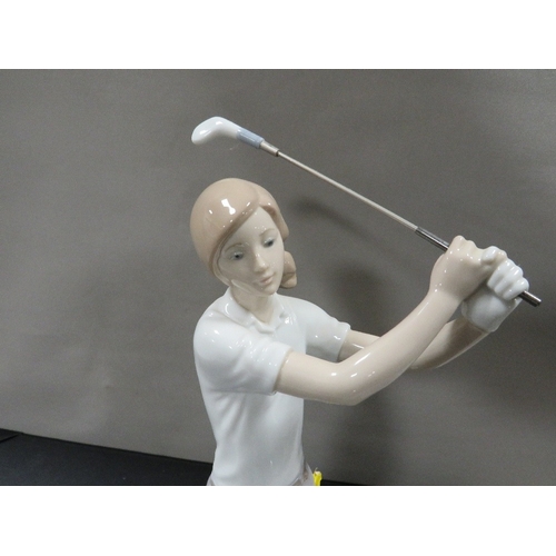 291 - A large Lladro figure of a female golfer