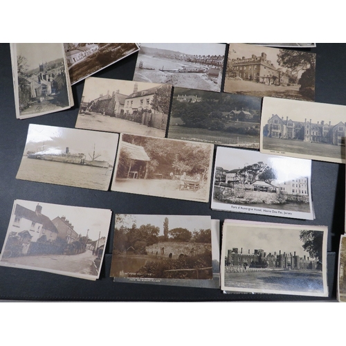 418 - A collection of real photograph postcards, to include topographical types