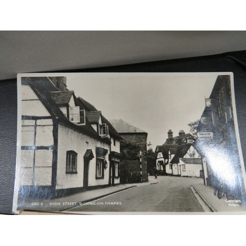 418 - A collection of real photograph postcards, to include topographical types