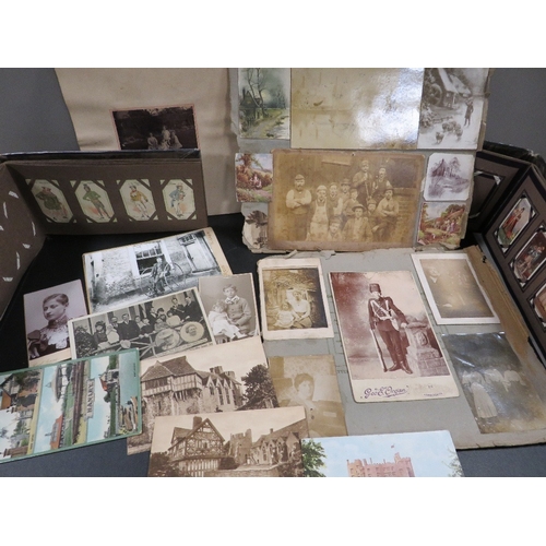 423 - Antique postcards, photographs, silks and cigarette cards