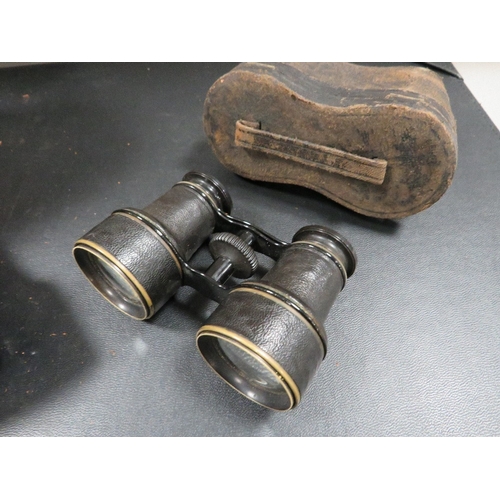 431 - An antique lacquered brass field glass and a set of opera glasses, both in leather cases