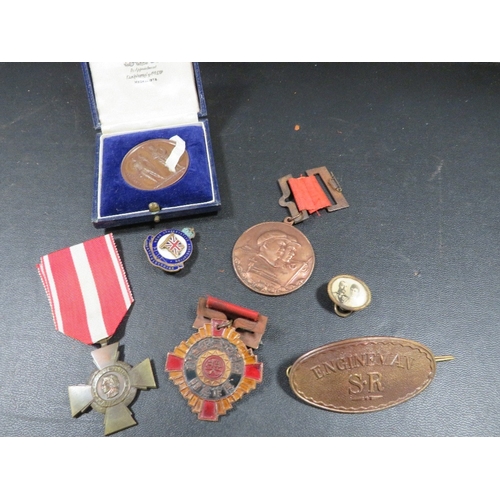 434 - A quantity of medals and badges, including and railway types