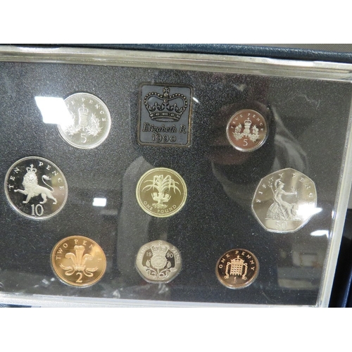 446 - A collection of mostly British coins to include UK proof set 1990, UNC 1989 £2 coin pair pack, UNC s... 