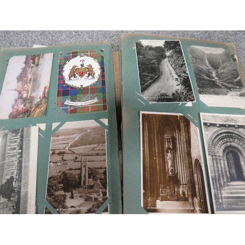 A VINTAGE POSTCARD ALBUM CONTAINING MANY CHURCH, CATHEDRAL, RELIGIOUS CARDS, SEASIDE CARDS ETC., plus four smaller albums to include saucy seaside cards, the other three containing some vintage cards together with five bags of loose cards