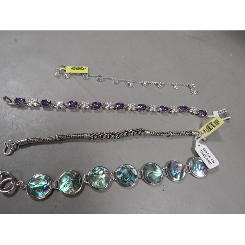Four assorted silver bracelets