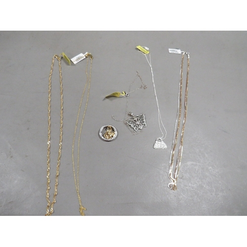 A selection of silver and silver gilt pendant necklaces and chains