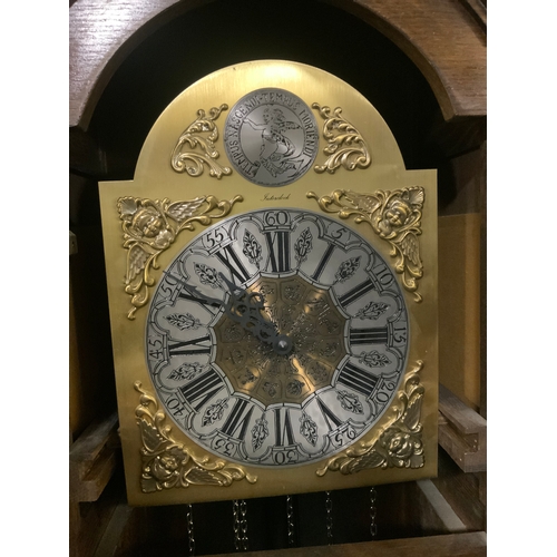 701 - A modern Interclock grandmother style clock with triple weight