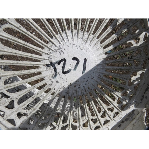 601 - A cast aluminium patio set comprising a table & four chairs