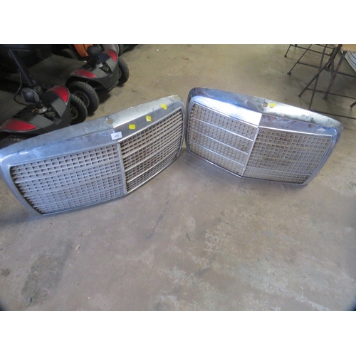 613 - Two chrome vintage car grills