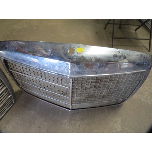 613 - Two chrome vintage car grills