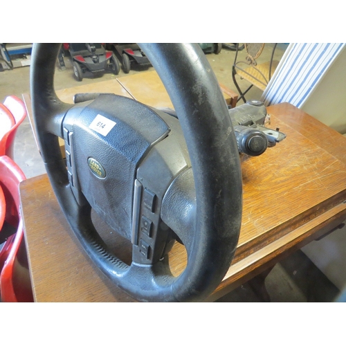 614 - A Land Rover steering column with lock and key - key in office