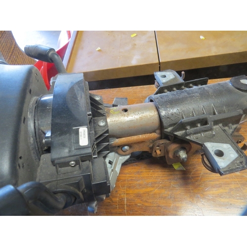 614 - A Land Rover steering column with lock and key - key in office