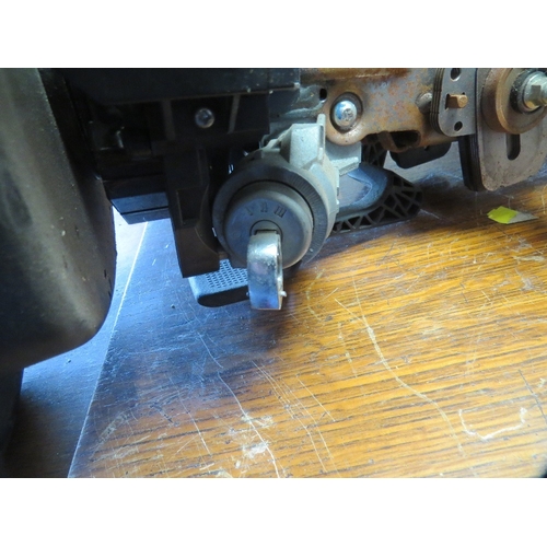 614 - A Land Rover steering column with lock and key - key in office